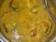Ikan patin masak tempoyak dengan kuah pekat dan berwarna kuning keemasan
